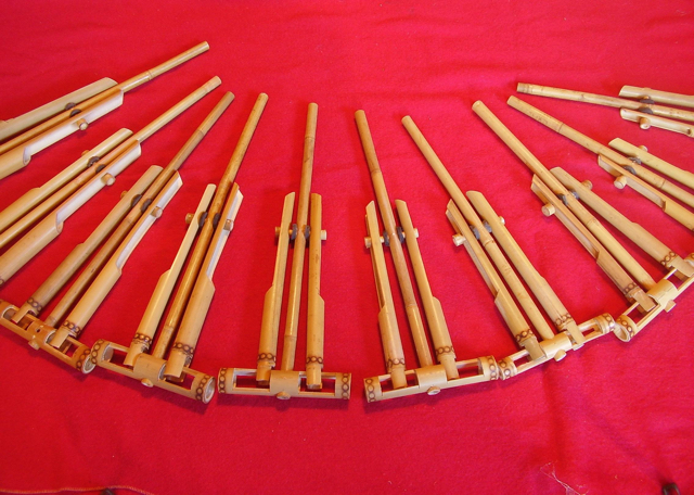 Bamboo angklettes playable in a group. Each plays a different pitch.
